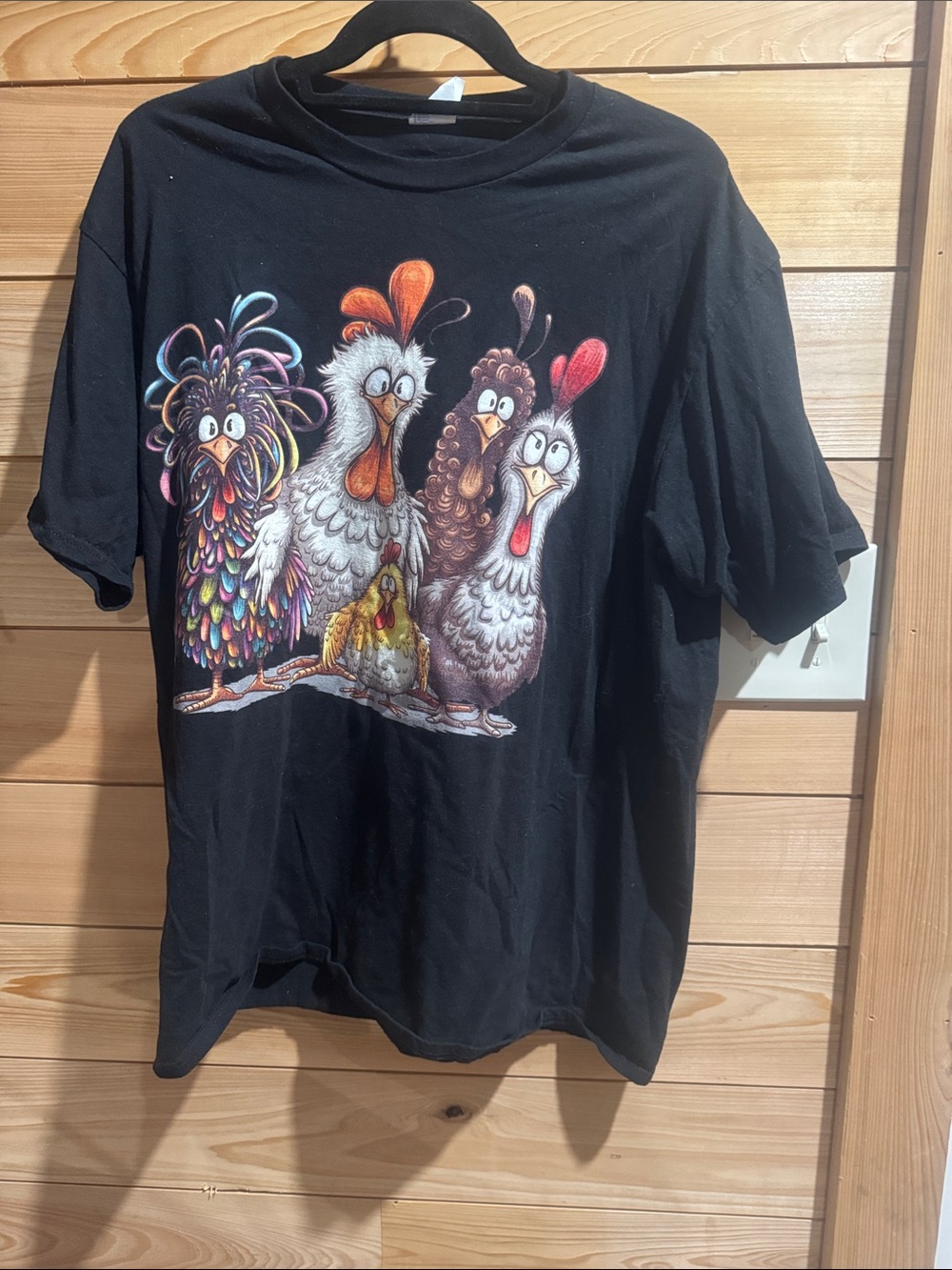 Port and Company Black T‑Shirt with Colorful Cartoon Chickens